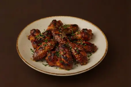 Barbekýu sously towuk ganatlary
